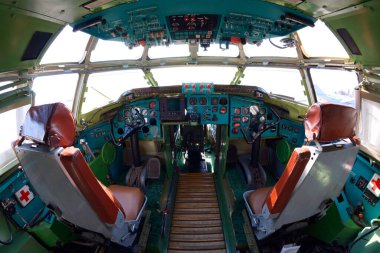 The cockpit of made in Ukraine transport aircraft, steering wheel, dashboards, two seats for pilots