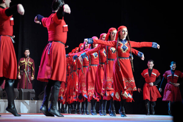 Famous Georgian dance ensemble Rustavi artists performing on stage. Concert in Kyiv. March 8, 2016. Kyiv, Ukraine