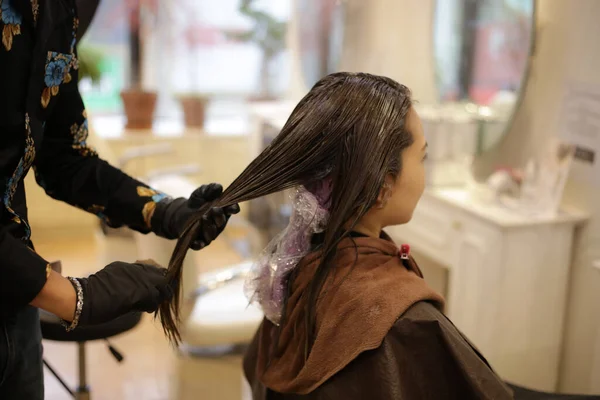Male Hairdresser Applying Drug Woman Hair —  Fotos de Stock