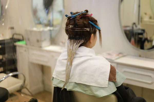 Woman Holding Her Hair Hair Clip —  Fotos de Stock