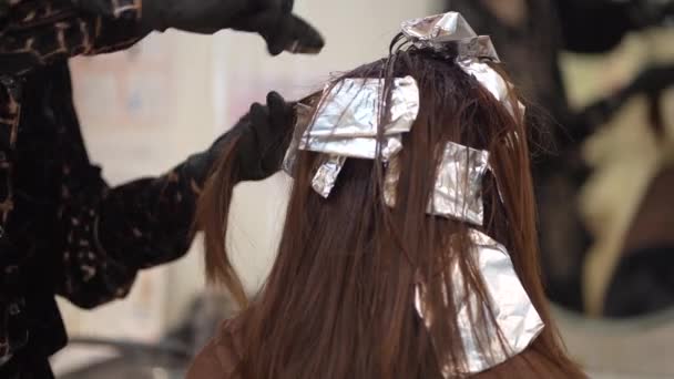 Male Hairdresser Applying Drug Woman Hair — Stock Video