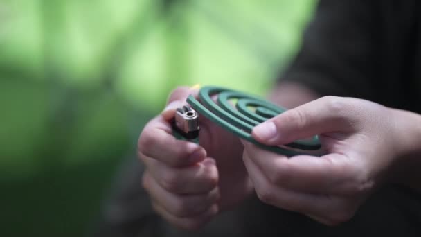 Woman Lighting Mosquito Coil — Stock Video
