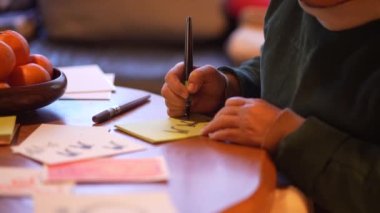 woman writing a picture letter