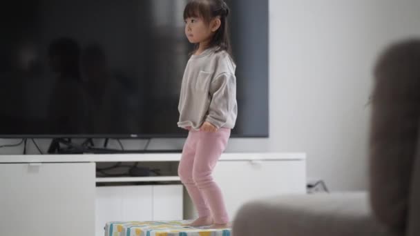 Girl Playing Indoor Trampoline — Stockvideo