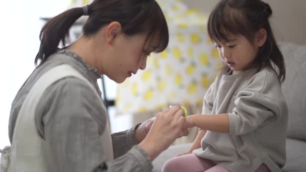 Mother Cutting Child Nails — Vídeos de Stock
