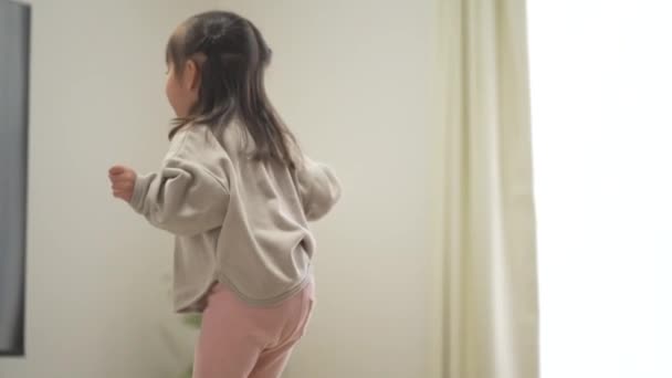 Girl Playing Indoor Trampoline — ストック動画