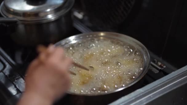 Woman Frying Sweet Potatoes — Stock Video