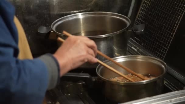 Woman Stewing Pork Belly — Stock Video