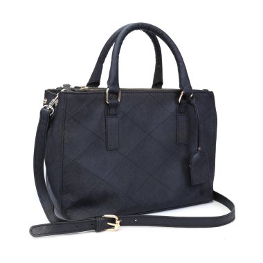 beyaz arka planda izole edilmiş desenli deri kadın çantası.