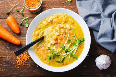 Lentil Soup, Tasty Homemade Vegetable Soup with Chicken and Herbs on Wooden Background, Healthy Eating