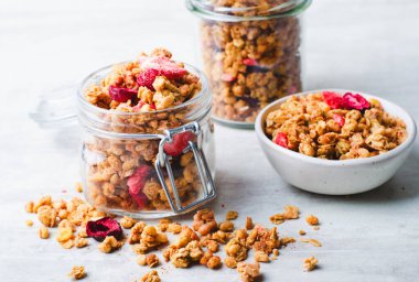 Granola with Dried Berries on Bright Background, Healthy Breakfast