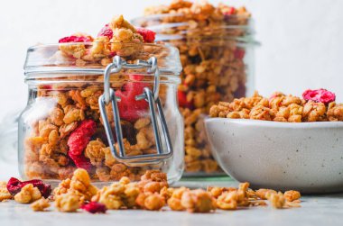 Granola with Dried Berries on Bright Background, Healthy Breakfast