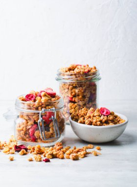 Granola with Dried Berries on Bright Background, Healthy Breakfast