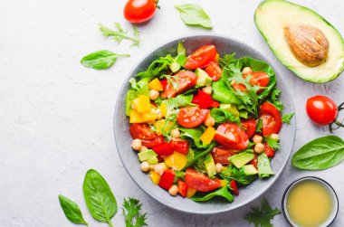 Vegetable Salad, Vegetarian Salad with Chickpeas, Avocado, Bell Pepper, Spinach, Cherry Tomatoes in a Bowl, Healthy Eating