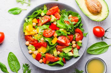 Vegetable Salad, Vegetarian Salad with Chickpeas, Avocado, Bell Pepper, Spinach, Cherry Tomatoes in a Bowl, Healthy Eating