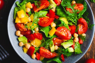 Vegetable Salad, Vegetarian Salad with Chickpeas, Avocado, Bell Pepper, Spinach, Cherry Tomatoes in a Bowl, Healthy Eating
