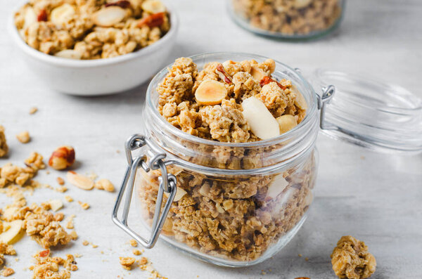 Granola with Nut Mix on Bright Concrete Background, Healthy Snack or Breakfast