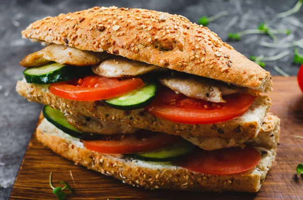 stock image Grilled Chicken and Vegetable Sandwich, Healthy and delicious snack, breakfast, dinner or lunch on Dark Background