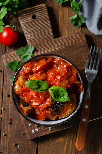 stock image Stewed Vegetables, Healthy Vegetarian Lunch, Vegetable Ratatouille on Dark Background