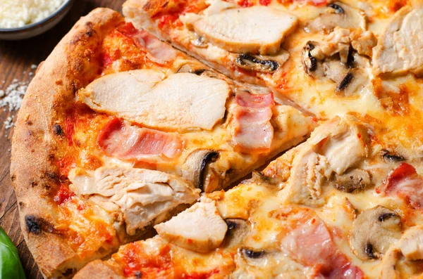 Frozen Chicken Mushroom Pizza on Dark Background, Stone Baked Pizza