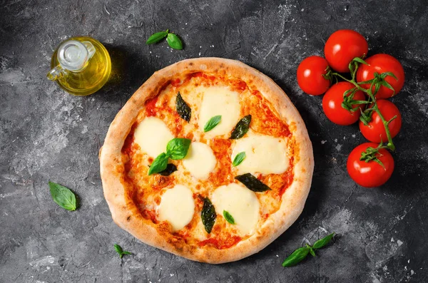 stock image Italian Pizza Margherita with Mozzarella and Basil Leaves on Dark Background, Freshly Baked Pizza