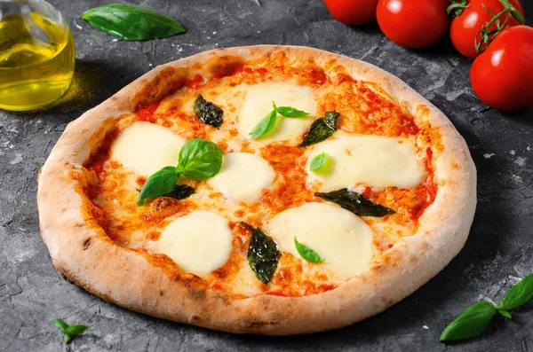 stock image Italian Pizza Margherita with Mozzarella and Basil Leaves on Dark Background, Freshly Baked Pizza