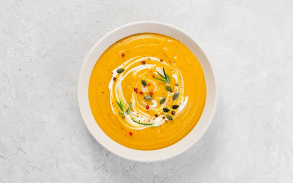 stock image Sweet Potato Soup, Tasty Homemade Pumpkin, Sweet Potato, Carrot Soup in a Bowl on Bright Background