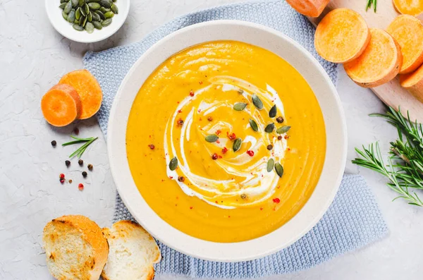 stock image Sweet Potato Soup, Tasty Homemade Pumpkin, Sweet Potato, Carrot Soup in a Bowl on Bright Background