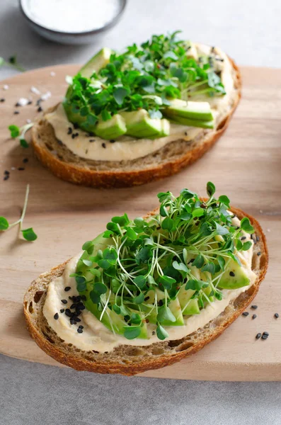 Avocado Hummus Toast Healthy Snack Vegan Breakfast Vegetarian Meal — стокове фото