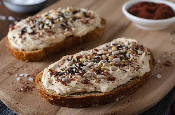 Hummus Toast Rustic Bread Vegetarian Snack Breakfast Rustic Wooden Background — стокове фото