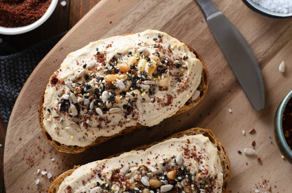 Hummus Toast Rustic Bread Vegetarian Snack Breakfast Rustic Wooden Background — стокове фото