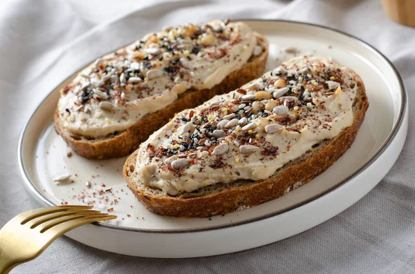Hummus Toast Rustic Bread Vegetarian Snack Breakfast Bright Grey Background — стокове фото