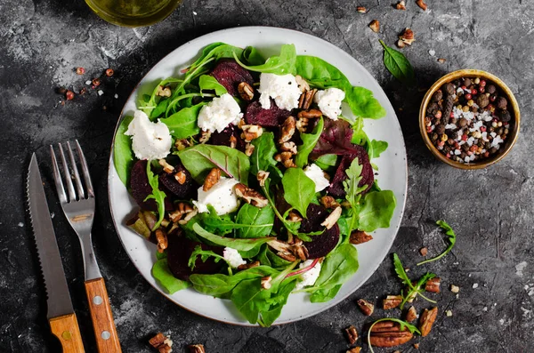 stock image Fresh Salad with Beetroot, Feta Cheese, and Pecans, Vegetarian Meal on Dark Background