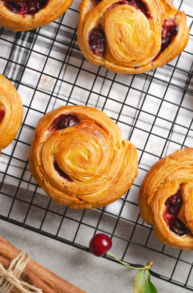 stock image Freshly Baked Puff Pastry with Cherries on Bright Light Grey Background