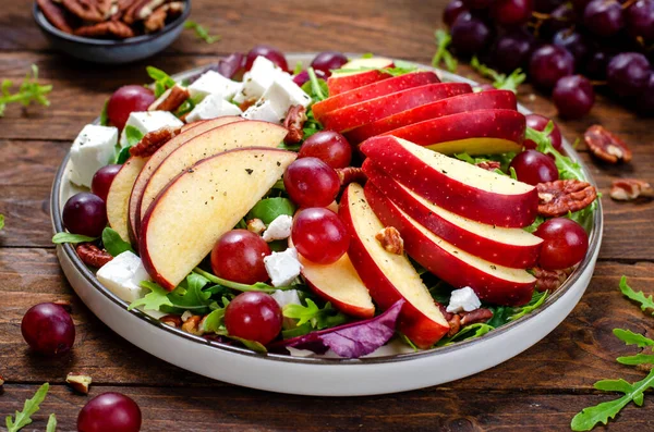 stock image Fresh Apple Salad with Grapes, Pecans, Arugula and Feta, Fall Salad on Wooden Background, Comfort Food