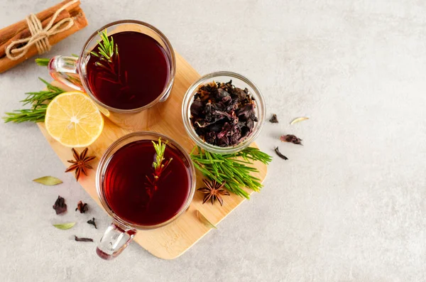Herbal Tea, Hibiscus Red Tea in Glass Mugs, Autumn or Winter Drink