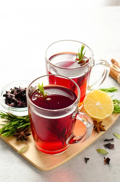 Herbal Tea, Hibiscus Red Tea in Glass Mugs, Autumn or Winter Drink