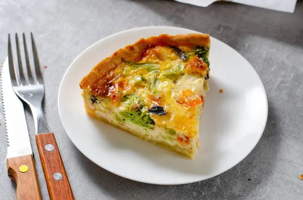 Quiche with Vegetables and Chicken, Homemade Open Pie, Savory Tart on Bright Background