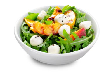 Arugula ve Mozzarella peynirli ızgara şeftali salatası.