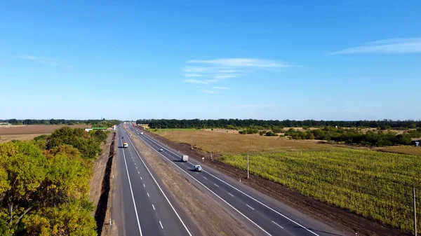 The route from Kharkov to Kupyansk from a bird\'s eye view.  Motorway in summer.  Drone photo.