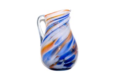 Multicolored glass jug on a white background