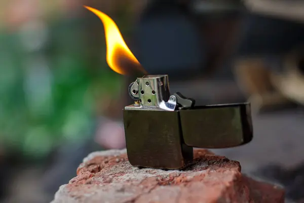 stock image Classic petrol lighter. Burning petrol lighter