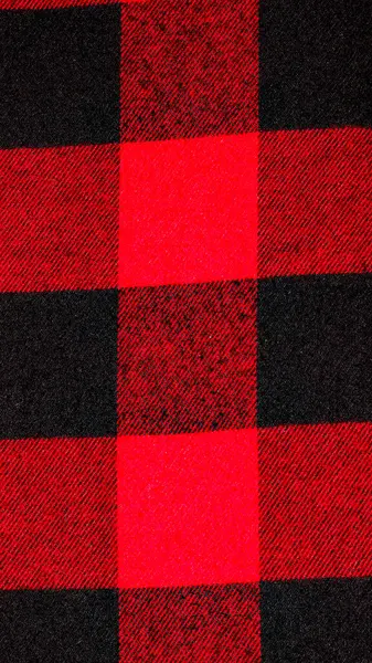 Arkaplan için kırmızı ve siyah kareli kumaş.