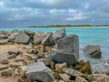 Large rocks used to break water on Saint Sebastian River in Florida.