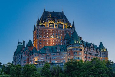 Close up view at dusk of the Hotel Frontenac in Quebec City Canada clipart