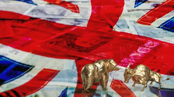 gold bull bear on uk flag for business concept 3d rendering