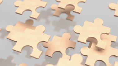 Yapboz işi, bir şirketin farklı parçalarını ya da stratejisini temsil eder. Yapboz parçaları gibi bir araya gelerek tam bir tablo oluşturur..