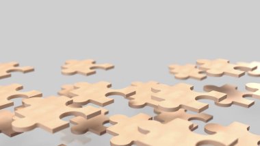 Yapboz işi, bir şirketin farklı parçalarını ya da stratejisini temsil eder. Yapboz parçaları gibi bir araya gelerek tam bir tablo oluşturur..