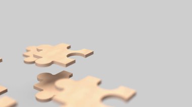 Yapboz işi, bir şirketin farklı parçalarını ya da stratejisini temsil eder. Yapboz parçaları gibi bir araya gelerek tam bir tablo oluşturur..