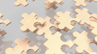 Yapboz işi, bir şirketin farklı parçalarını ya da stratejisini temsil eder. Yapboz parçaları gibi bir araya gelerek tam bir tablo oluşturur..